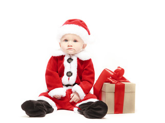 Santa Claus baby in red christmas clothes with gift box isolated on white