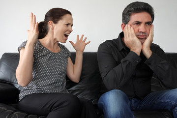 Nagging wife complains to her husband © Rafael Ben-Ari