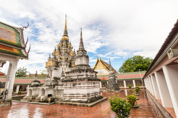 Fototapeta na wymiar Wat Phra Boromathat Chaiya Ratchaworawihan with after raining sky in Nakhon Si Thammarat, famous temple in south of Thailand