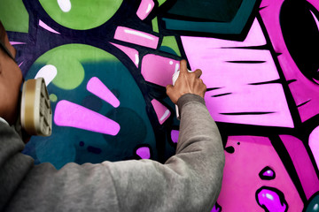 Graffiti artist painting