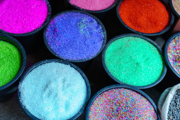 Colorful sands in boxes