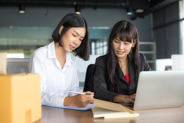 Young Asian Woman holding box with smiling together, Young Owner Woman Start up for Business...