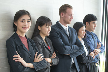 Businesswoman standing with Team at Office Place, Woman standing with Attractive Smiling, Businrss People with Teamwork concept, 20-30 years old.