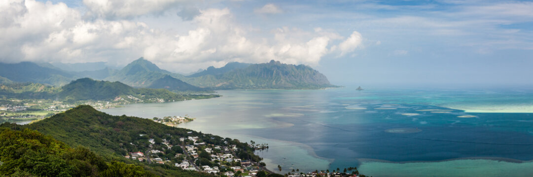 Scenic day seascape panorama of Kaneohe Bay and Kualoa Ridge in the distance. Oahu, Hawaii, USA.