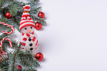 New Year background with snowman and fir tree