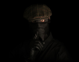 Creepy burglar breaking and entering