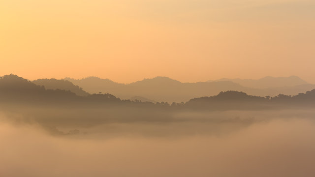 Sunrise and sea of mist at Khao Phanoen Thung, Kaeng Krachan National Park in Thailand