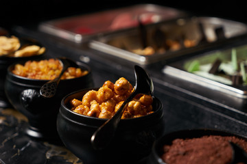 Different kinds of colorful fruit ice cream in boxes