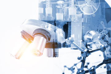 Smart scientist technology concept. Double exposure of microscope , science equipment glasses and...