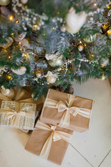 Christmas tree with gifts. Home