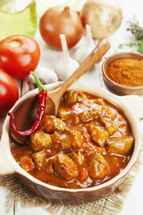 Meat stew in tomato sauce