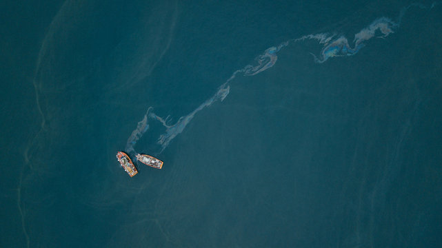 Fishing Boats And Oil Spill