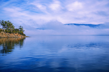 View of Bruny Island beach in Tasmania, Australia in the late afternoon.
