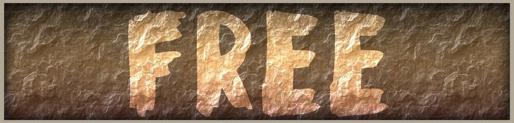 FREE written with paint on rock panel background