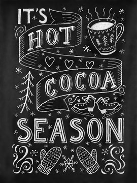 Hot cocoa season hand lettering quote on chalk board with decorations. Kitchen, bar, restaurant, cafe art poster