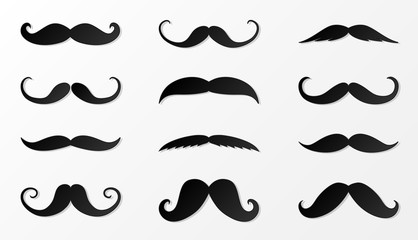 Collection of black moustache made of paper. Vector.