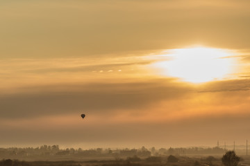 Obraz premium Sunset over the field
