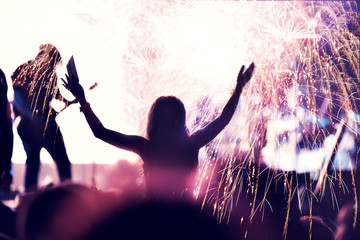 Crowd and fireworks, New Year concept