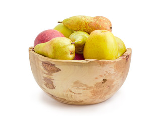 Apples and pears in the rustic wooden fruit bowl