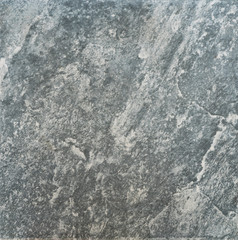Closed up texture of grey ceremic tile, imitated pattern of granite rock.