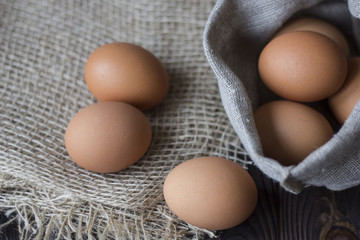 sack bag with eggs on the old table