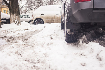 winter tire in snow closeup