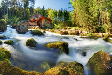 Austria panorama landscape with waterfall and watermill near Salzburg, Golling Alps