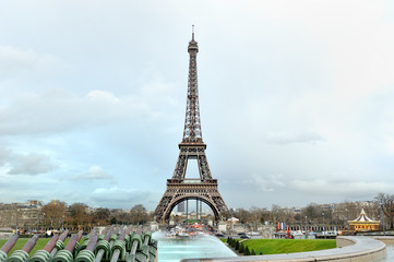 Fototapeta premium Eiffel tower panoramic view in a cloudy day, Paris, France