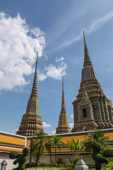Fototapeta premium Pagoda is in Wat Pho that was named as the temple of the pagoda or chedi that are decorated with yellow glaze or glazed tiles or dark blue
