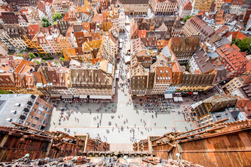 Top cityscape view on the cathedral square crowded with people in the old town of Strasbourg city, France - obrazy, fototapety, plakaty