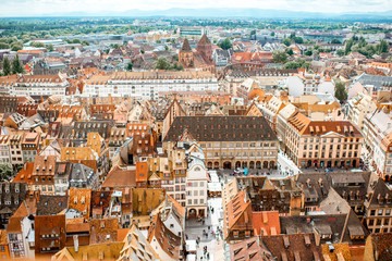 Fototapeta na wymiar Aerial cityscape view on the old town with beautiful rooftops in Strasbourg city, France