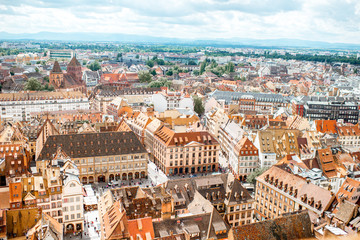 Fototapeta na wymiar Aerial cityscape view on the old town with beautiful rooftops in Strasbourg city, France