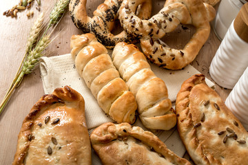 Ham and cheese stuffed pastry on rustic background