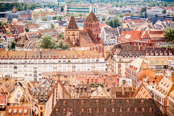 Aerial cityscape view on the old town with saint Thomas church in Strasbourg city in France