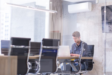 businessman working using a laptop in startup office