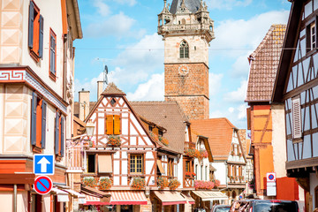 Fototapeta premium Cityscape view on the old village with medieval tower in Obernai town in Alsace region, France