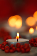 Christmas candles with berries