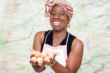 young woman holding organic eggs