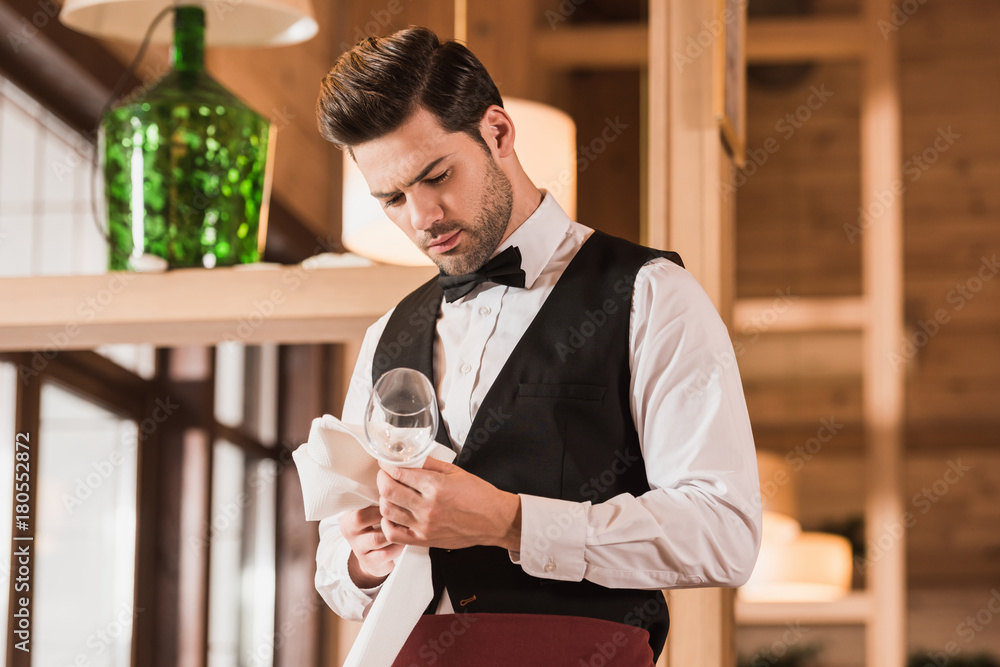 Canvas Prints waiter cleaning wineglass