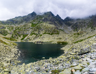 Fototapeta na wymiar Beautiful mountain lake under the Rysy mountain, High Tatras (Vysoke Tatry) Slovakia