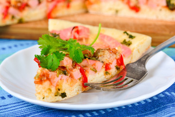 Piece of homemade pizza on a plate