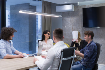 Startup Business Team At A Meeting at modern office building