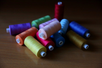 Colorful threads ready for use by artists and hobbyists.
