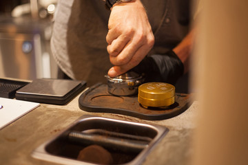 Tamping Espresso Shot with Hand