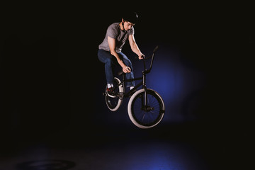 bmx cyclist performing stunt