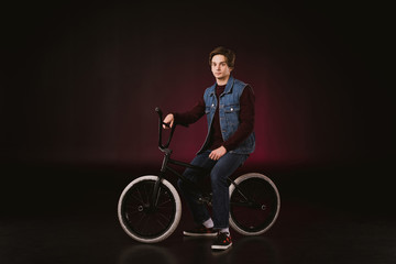 young cyclist with bmx bicycle