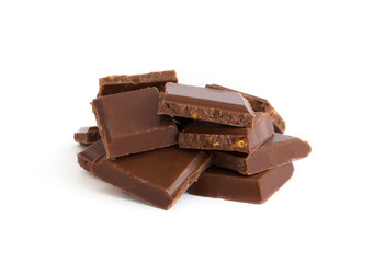 pieces of chocolate in group on white background isolated