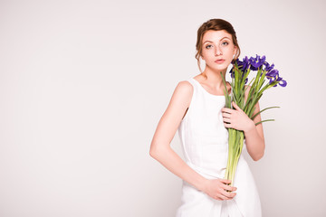 beautiful woman with iris flowers