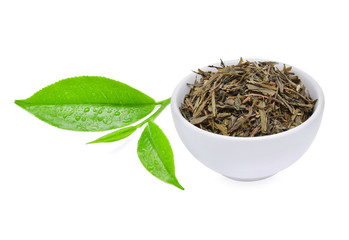 Fototapeta na wymiar Green tea leaves with dried tea leaves isolated on white background.