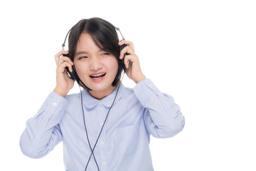 Portrait of a young business woman smiling with earbuds / headphone for listening to music or talking on smart phone. Isolated on white background